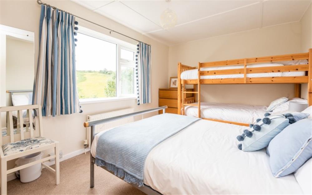 The family bedroom with double bed and bunk beds sleeping 4 at Hillsview in Polperro