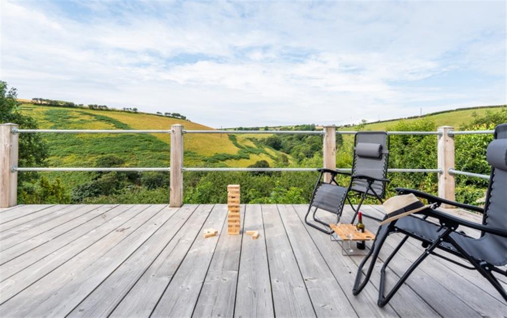 The spacious decked terrace with great rural hillside views at Hillsview in Polperro