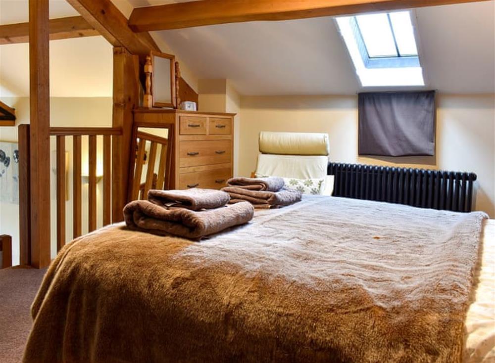 Mezzanine level master bedroom (photo 2) at Hilltoft Barn in Dockray, near Ullswater, Cumbria