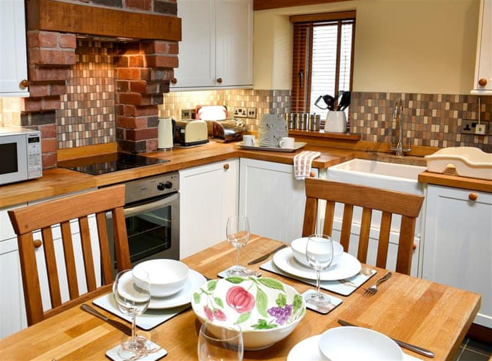 Well-equipped kitchen and dining area at Hilltoft Barn in Dockray, near Ullswater, Cumbria