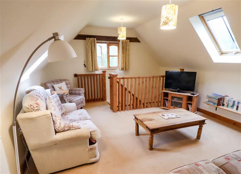 Relax in the living area at Hilltop Barn, Welbourn
