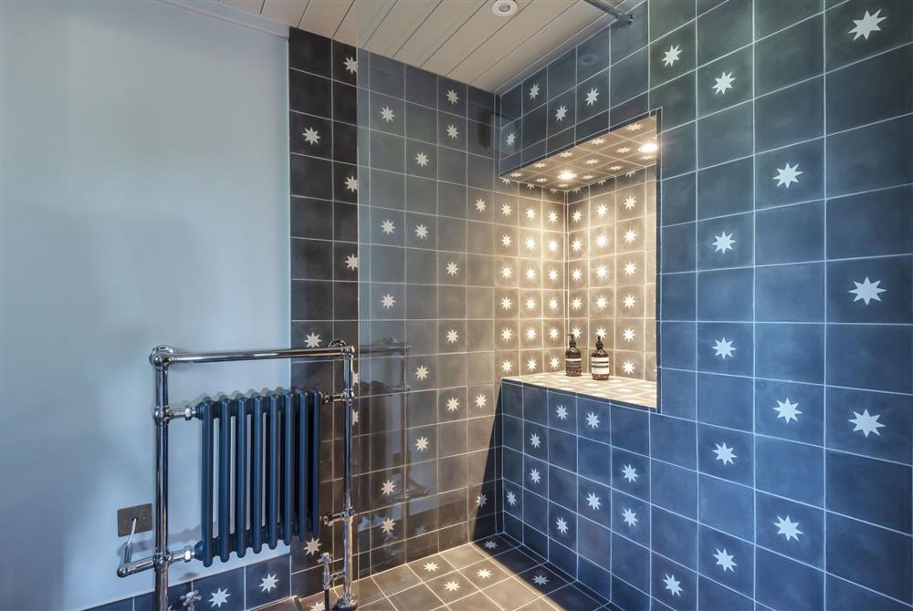 The stylish shower and cloakroom