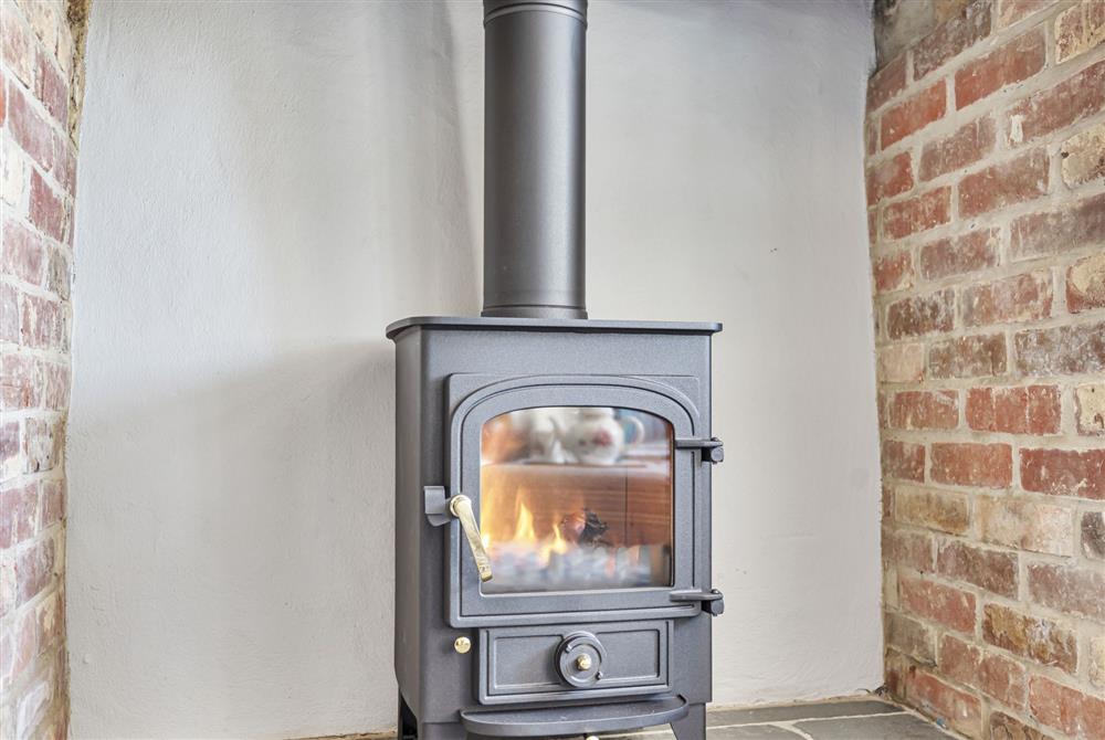 There are two wood-burning stoves at this delightful cottage at Hilltop Cottage, Wimborne