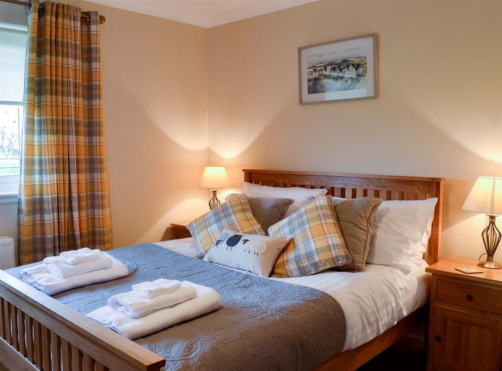 Relaxing bedroom with kingsize bed at Hillview in Gateside, near Beith, Ayrshire