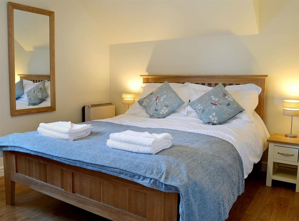 Relaxing double bedroom with kingsize bed at Hindscarth in Keswick, Cumbria