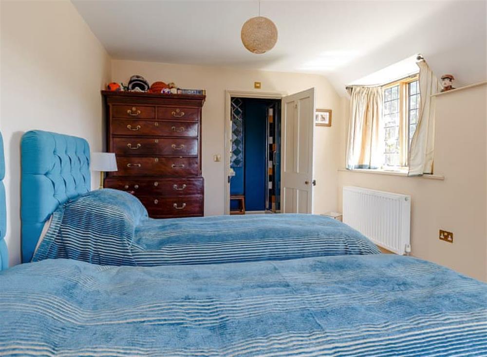 Cosy twin bedroom at Hinton Manor in Hinton Manor, England