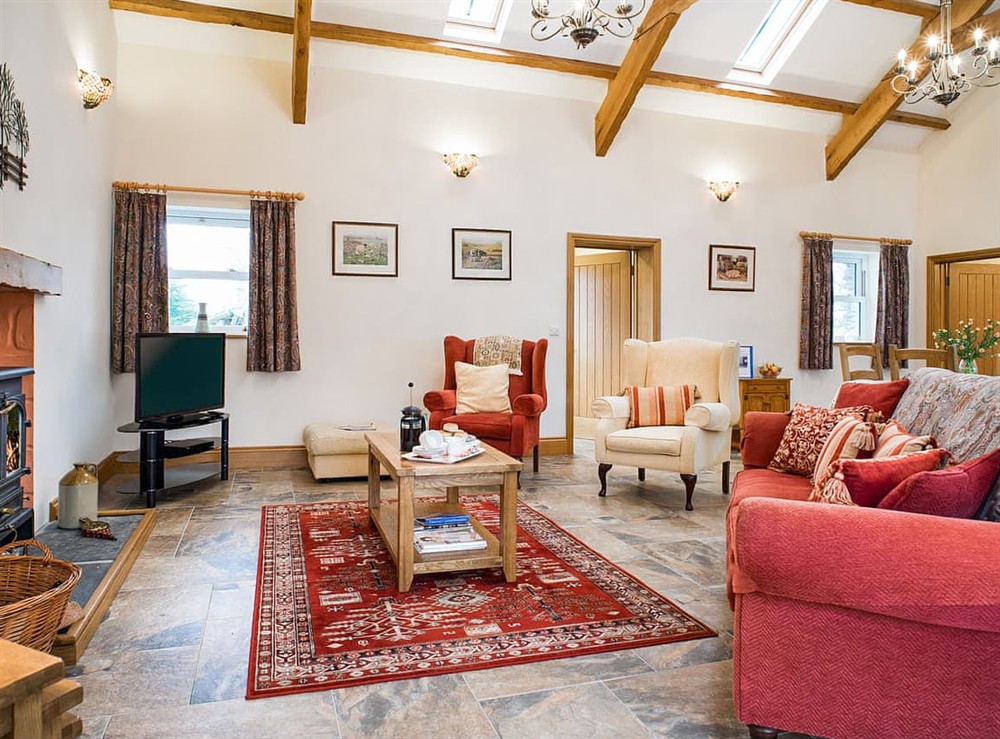 Open plan living space at Hirwaun Cottage in Ponthirwaun, Dyfed