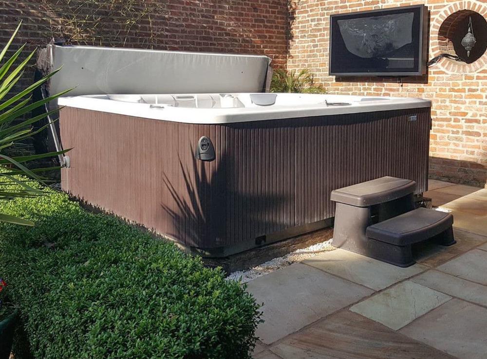 Luxurious hot tub at Hockwold Hall in Hockwold, near Thetford, Norfolk