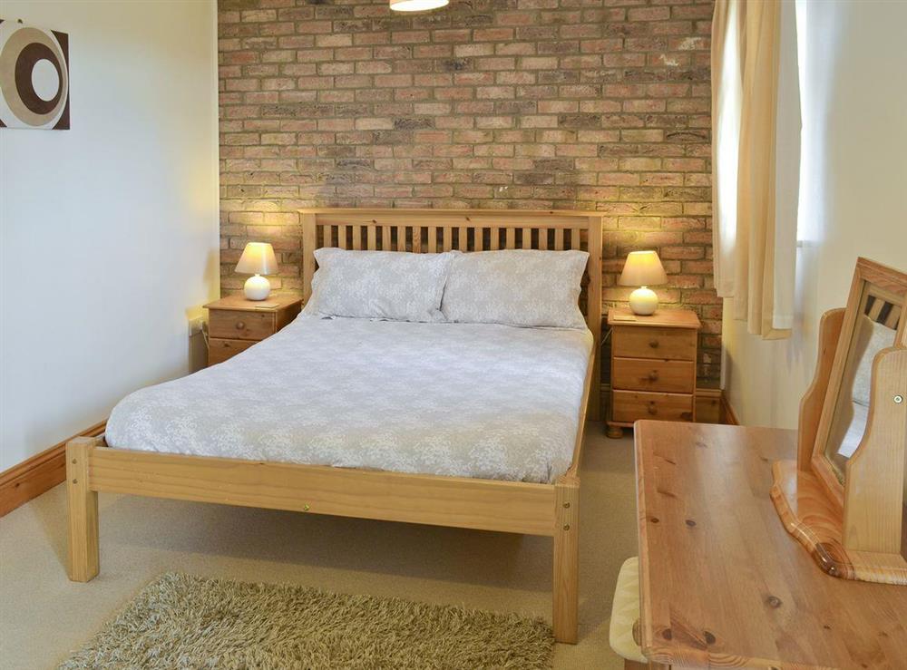 Comfortable double bedroom at Hoggard Cottage in Muston, Filey, North Yorkshire