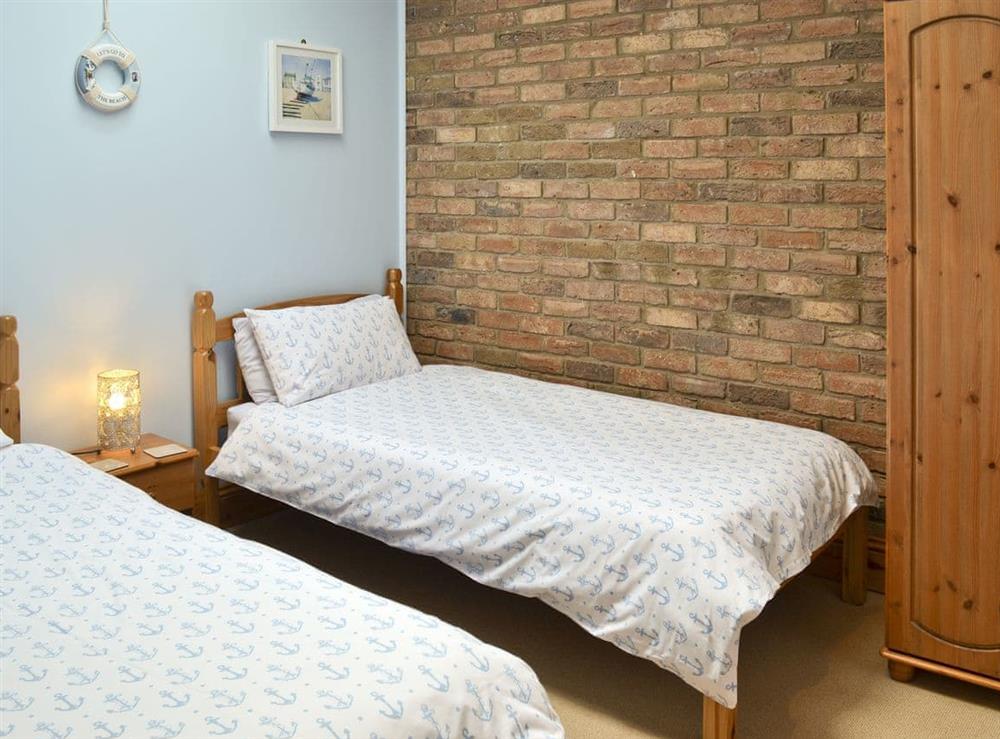 Relaxing twin bedroom at Hoggard Cottage in Muston, Filey, North Yorkshire