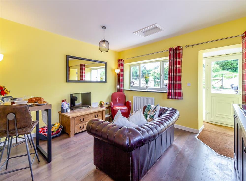 Open plan living space at Hoglet Cottage in Ammanford, Dyfed