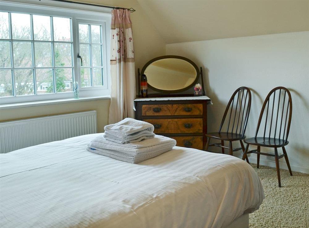 Light and airy bedroom with double bed at Holbeck Apartment in Scarborough, North Yorkshire