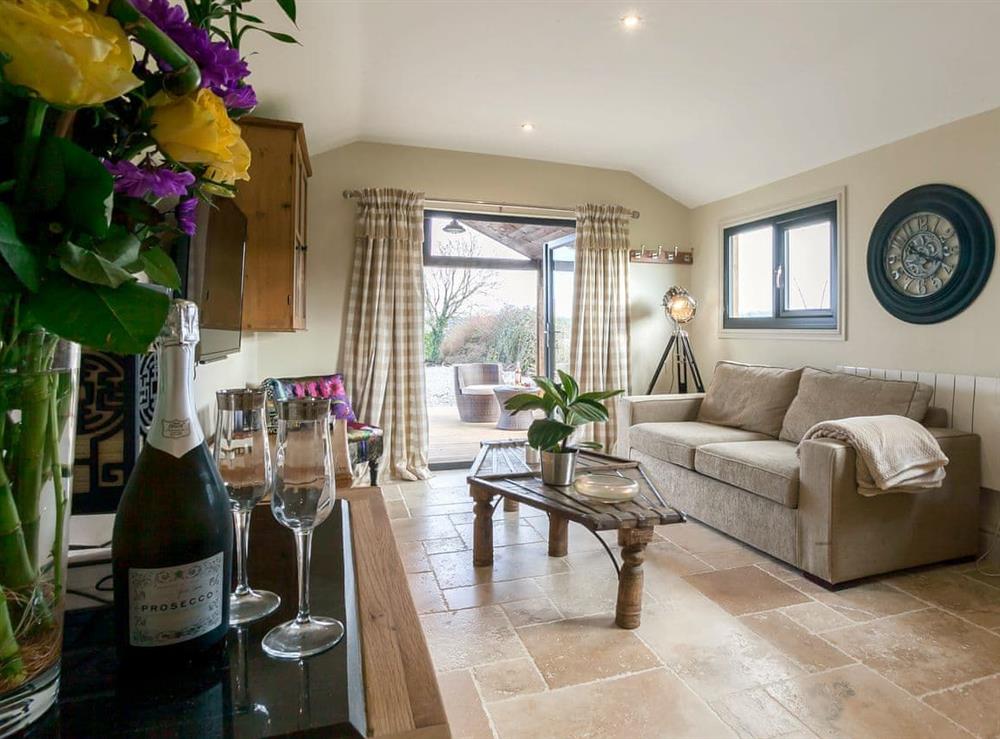 Cosy open plan living space at Holders Cottage in Rudford, near Gloucester, Gloucestershire