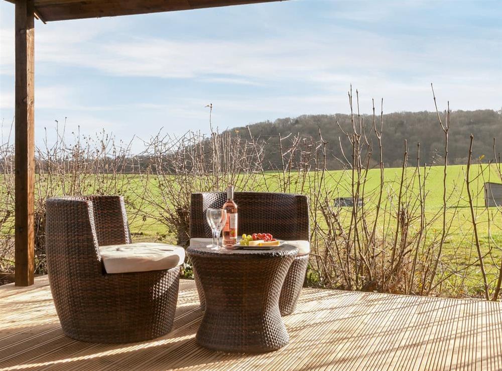 Private terrace with garden furniture and lovely countryside views at Holders Cottage in Rudford, near Gloucester, Gloucestershire