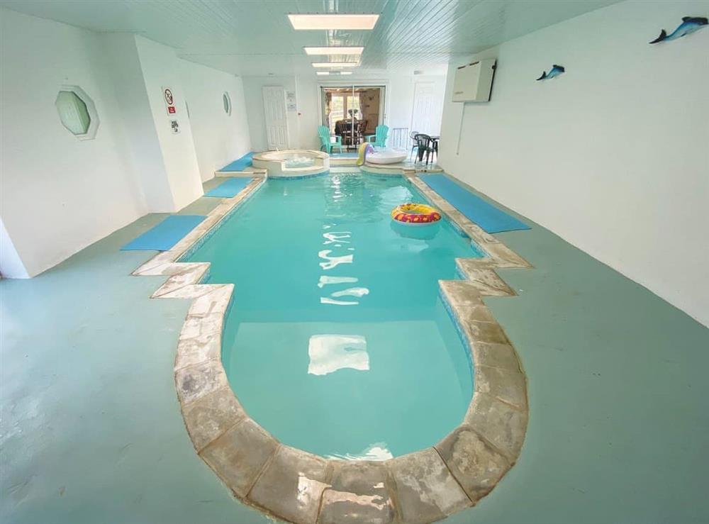 Swimming pool at Holemoor Cottage in Pyworthy, near Holsworthy, Devon