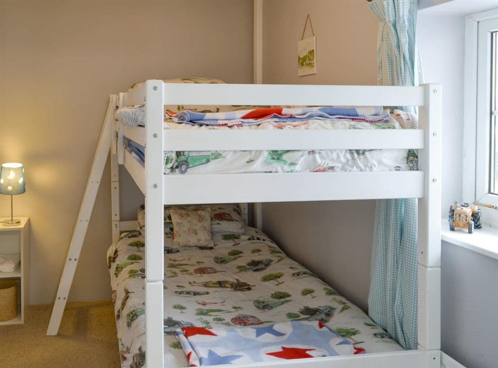 Useful bunk bedroom at Holemoor Cottage in Pyworthy, near Holsworthy, Devon