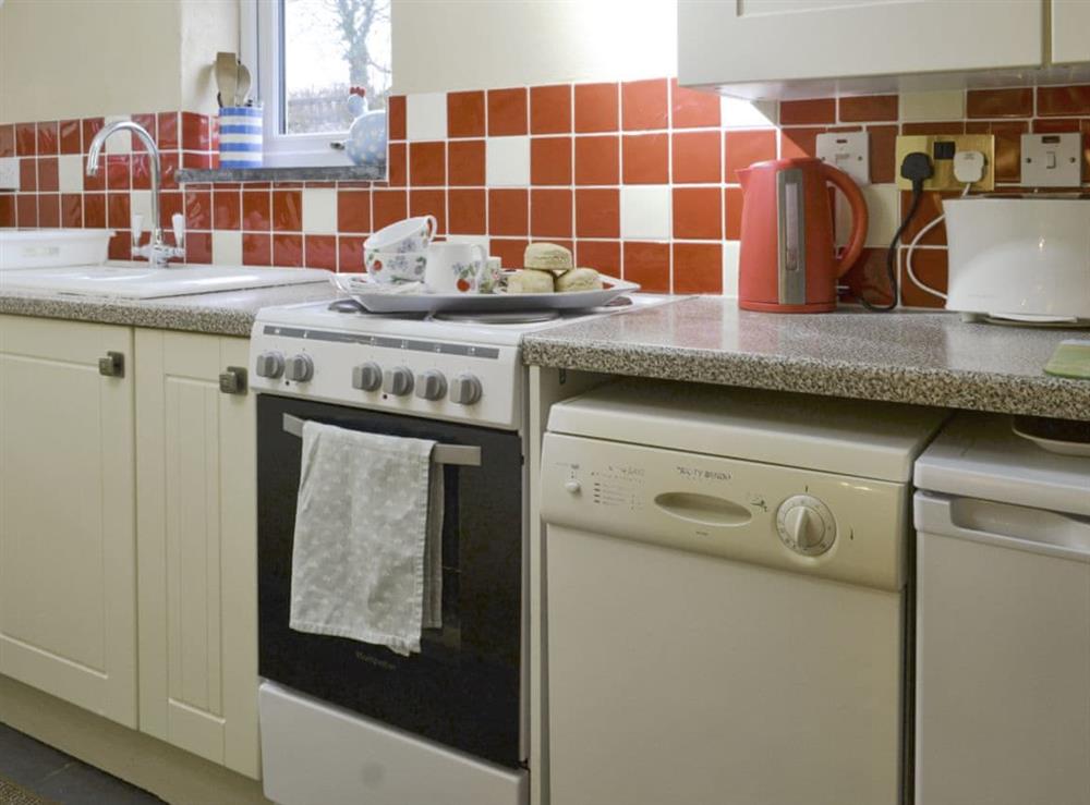 Well-equipped fitted kitchen at Holemoor Cottage in Pyworthy, near Holsworthy, Devon