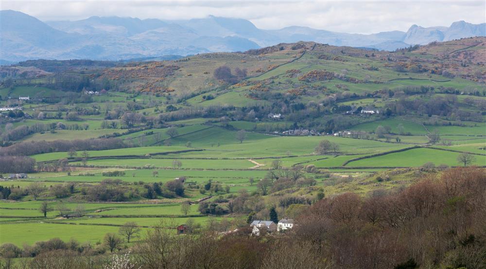 Views of fields and hills on the wider Sizergh Castle estate at Holeslack Cottage in Kendal, Cumbria