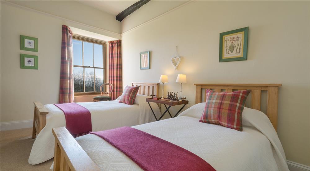 One of the twin bedrooms (photo 2) at Holeslack Farmhouse in Kendal, Cumbria