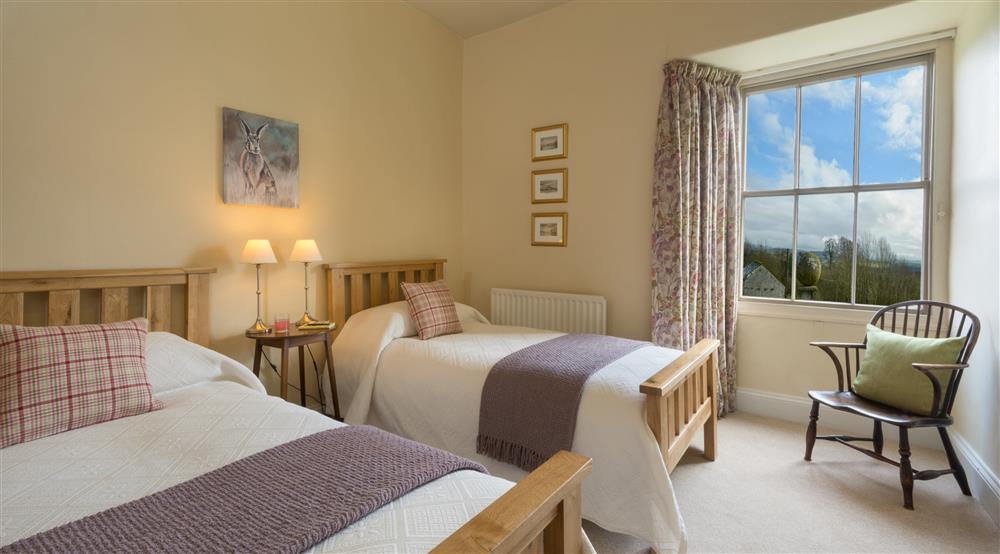 One of the twin bedrooms at Holeslack Farmhouse in Kendal, Cumbria