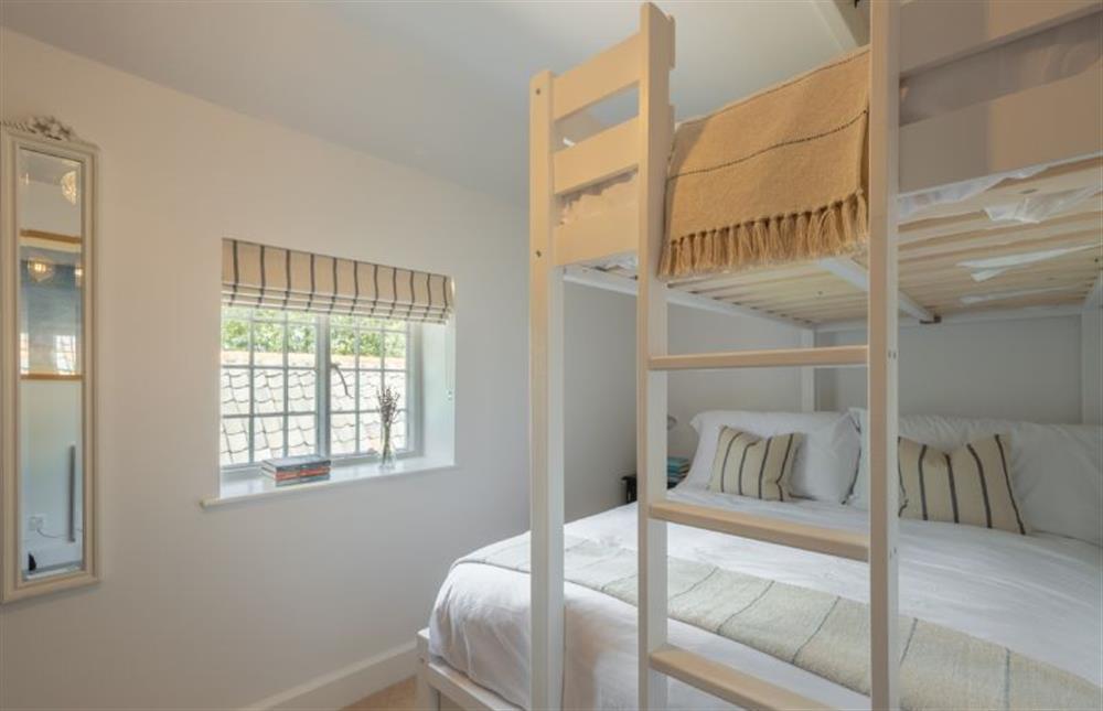 First floor: Bedroom two has a double and single bunk (photo 3) at Holkham Skies, Wells-next-the-Sea