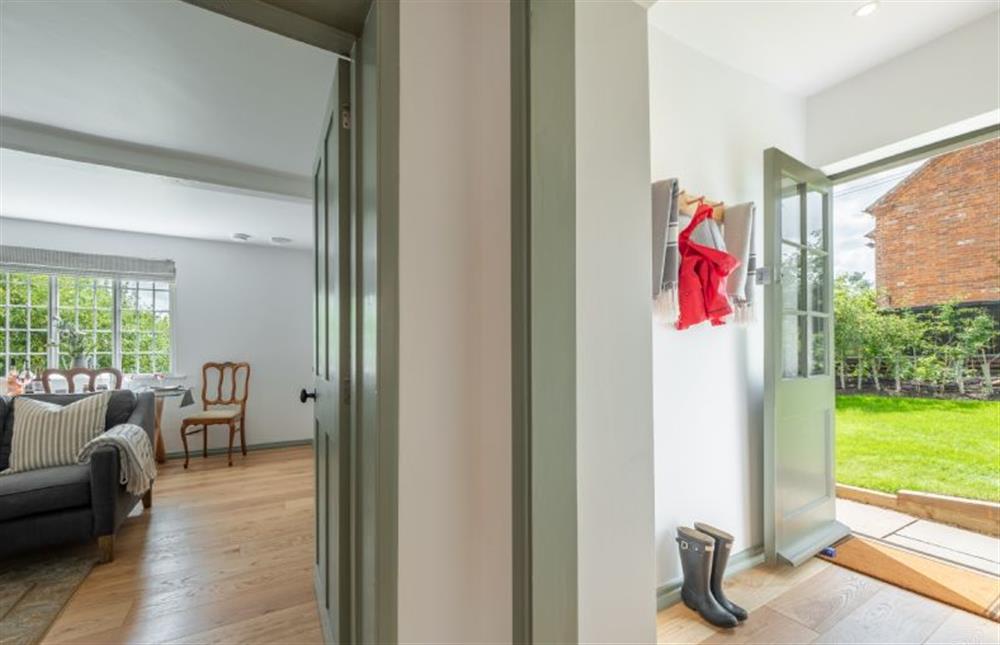 Ground floor: Sitting room and back door at Holkham Skies, Wells-next-the-Sea