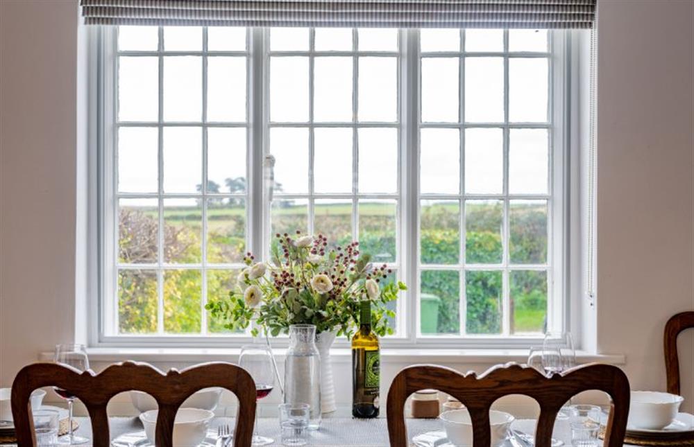 Ground floor: The dining table overlooks the garden at Holkham Skies, Wells-next-the-Sea