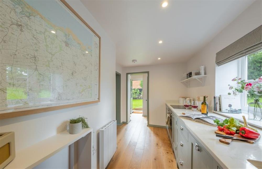 Ground floor: The kitchen leads to the bathroom and back door at Holkham Skies, Wells-next-the-Sea