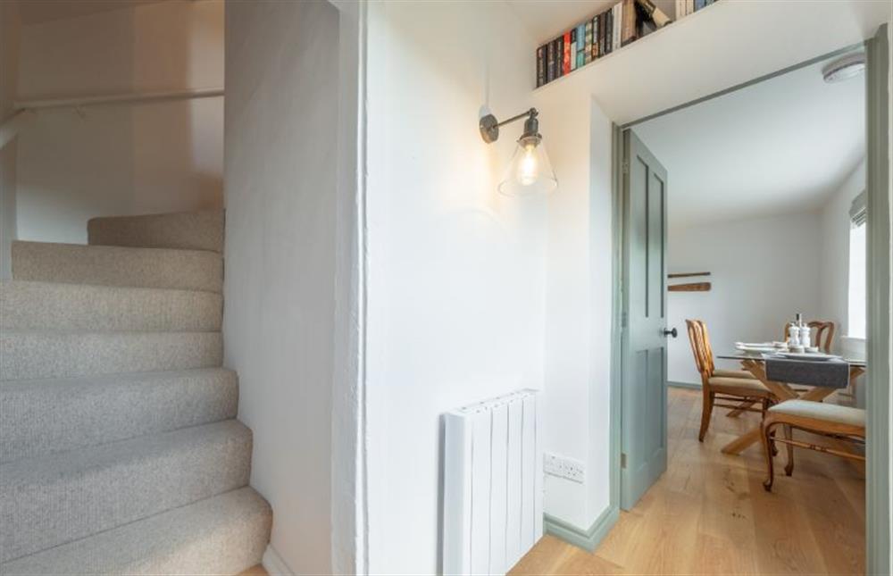 Steep Norfolk winder stairs at Holkham Skies, Wells-next-the-Sea