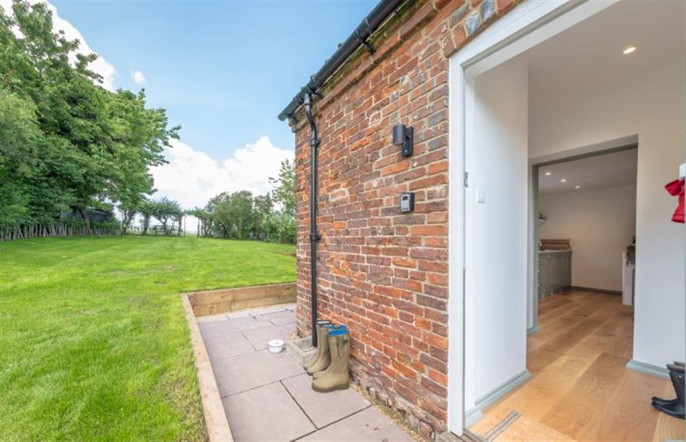 The back garden and the kitchen at Holkham Skies, Wells-next-the-Sea