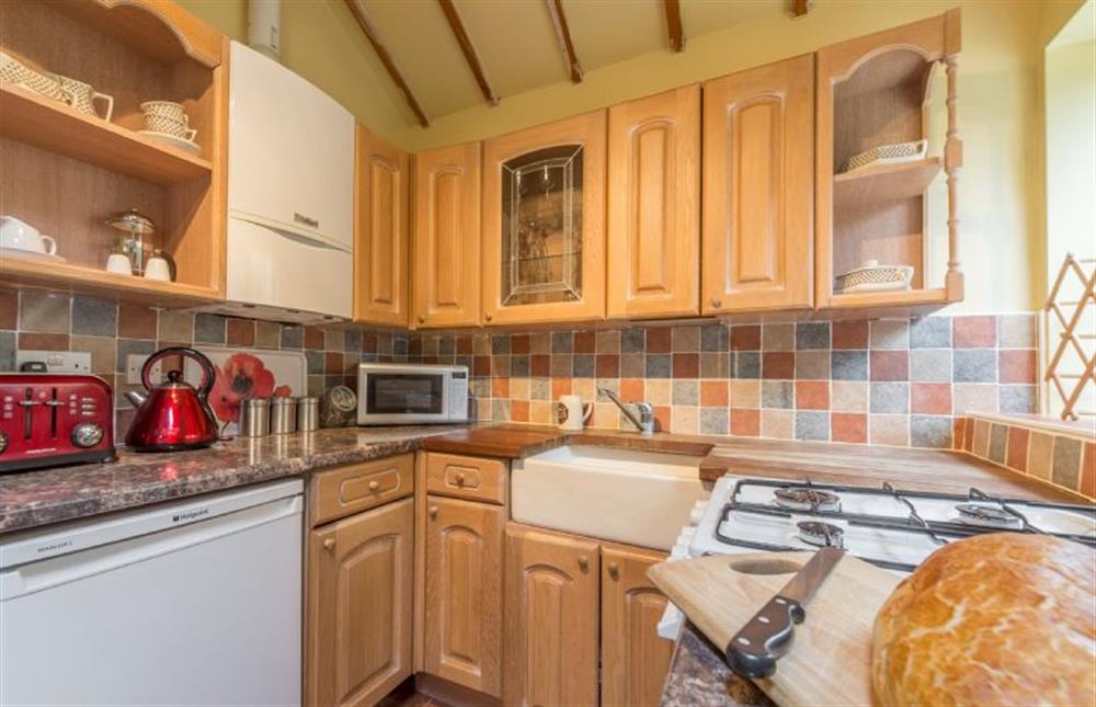 Ground floor: The kitchen has a butler sink at Holland House Barn, Docking near Kings Lynn