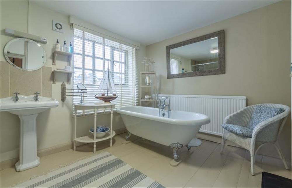 First floor: En-suite bathroom in Sandringham has separate shower cubicle at Holland House, Docking near Kings Lynn