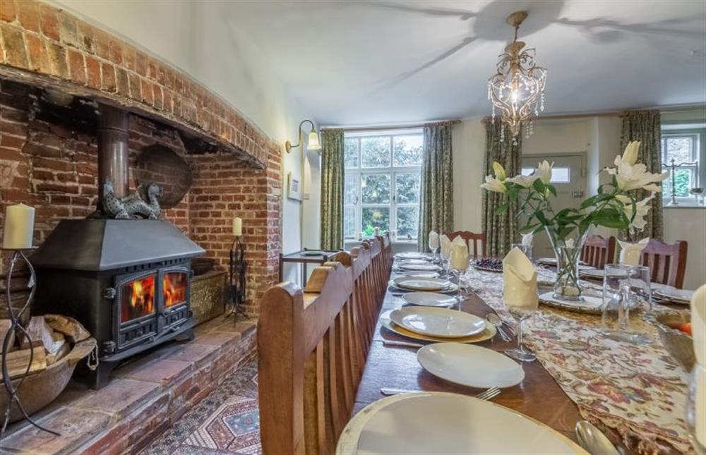 Ground floor: The dining room has big wood burning stove at Holland House, Docking near Kings Lynn