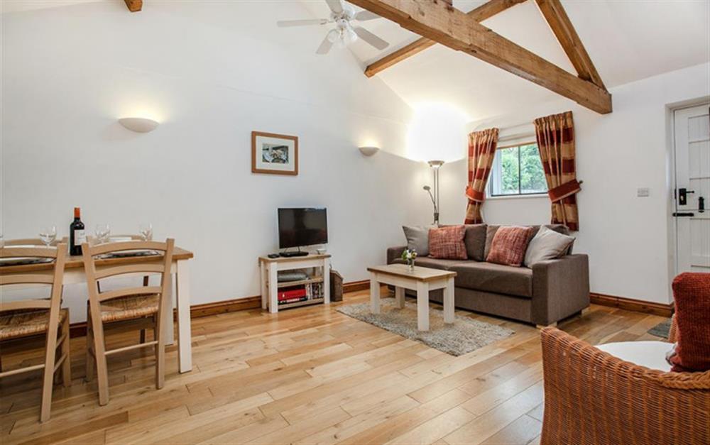 Sympathetically restored with high oak-beamed ceilings  at Hollie Cottage in Seaton