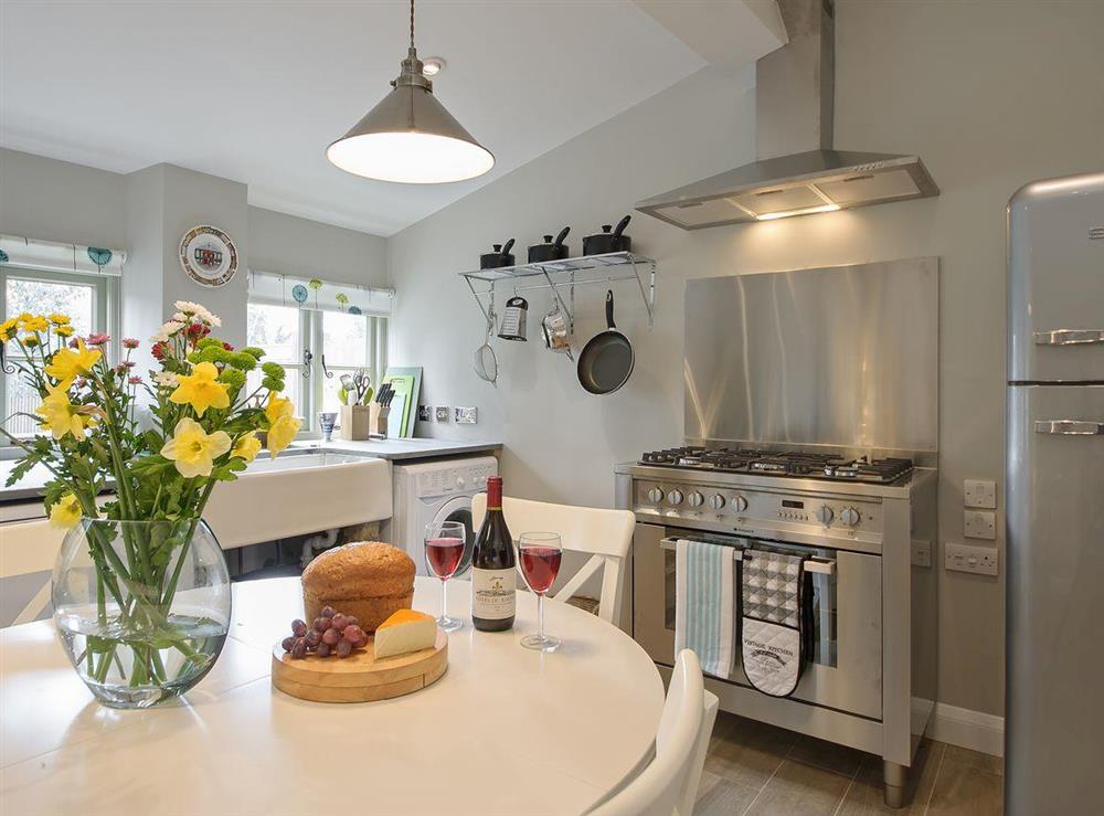 Lovely family kitchen with belfast sink (photo 2) at Holliers Cottage in Middle Barton, near Chipping Norton, Oxfordshire