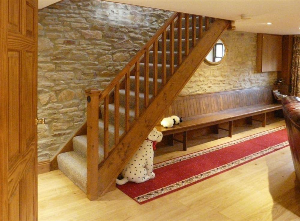 open plan stairs lead out of the spacious lounge at Hollin Bank Cottage in Salterforth, near Barnoldswick, Lancashire, England