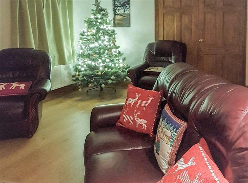 spend winter evenings in the cosy lounge at Hollin Bank Cottage in Salterforth, near Barnoldswick, Lancashire, England