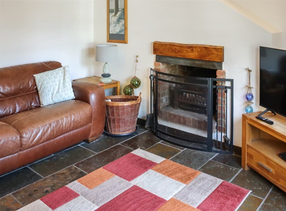 Living area (photo 2) at Holly Cottage in Angle, Dyfed