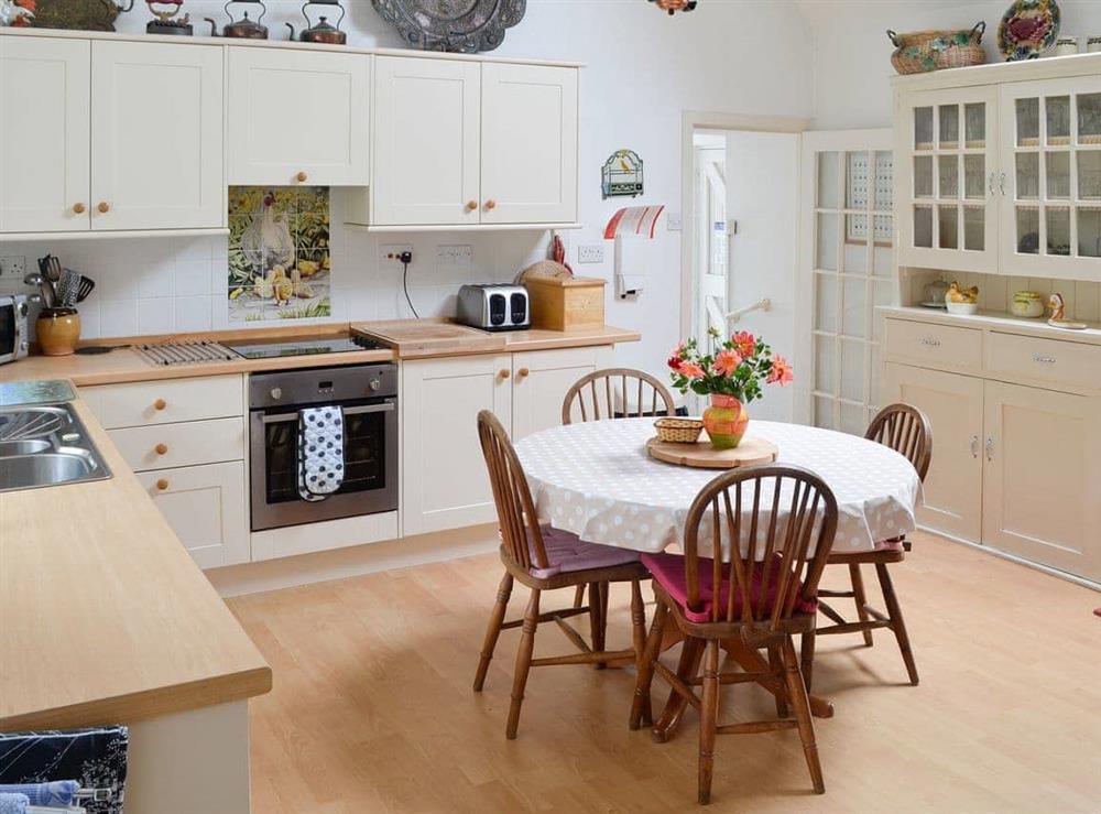 Farmhouse style kitchen/diner at Holly Cottage in Colvend, near Rockcliffe, Kirkcudbrightshire