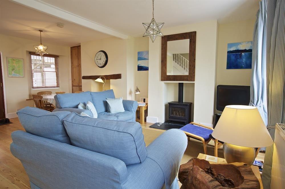 Comfortable lounge with sofas and chairs at Holly Cottage in Devon Road, Salcombe