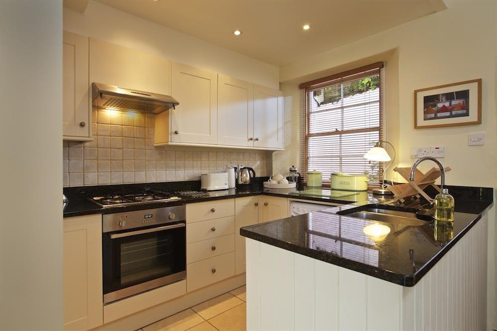 Fully refurbished kitchen with granite worktops at Holly Cottage in Devon Road, Salcombe