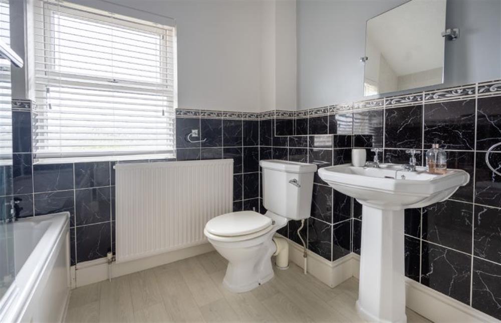 First floor: Bathroom at Holly Cottage, Heacham near Kings Lynn
