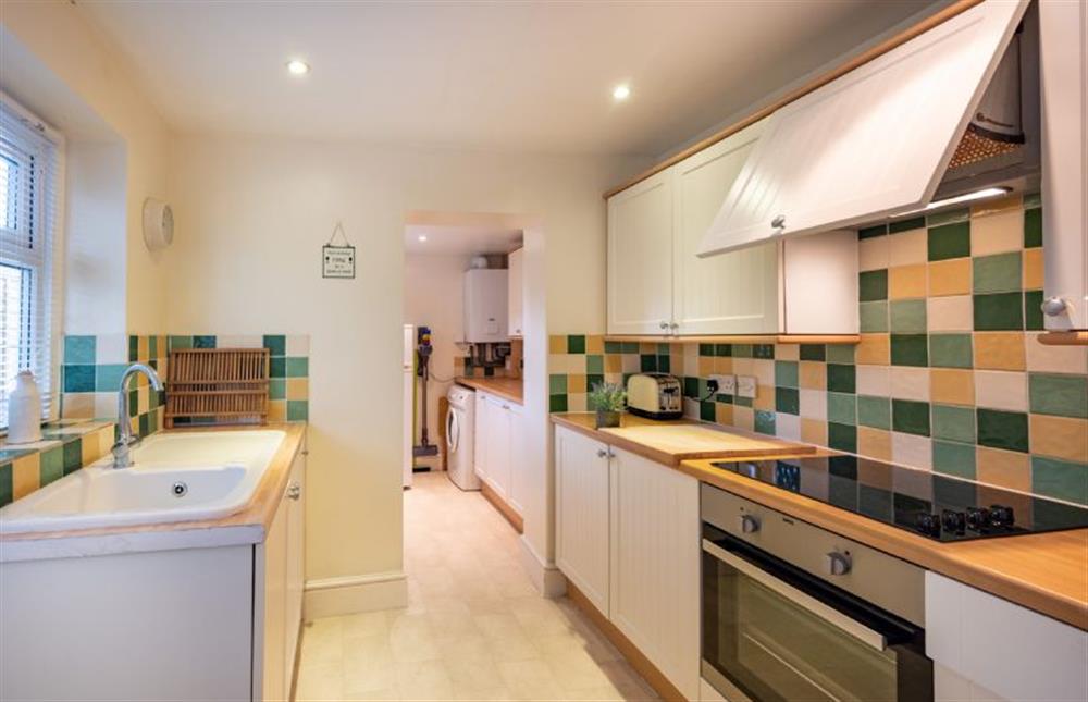 Ground Floor: Kitchen leading onto the enclosed garden at Holly Cottage, Heacham near Kings Lynn