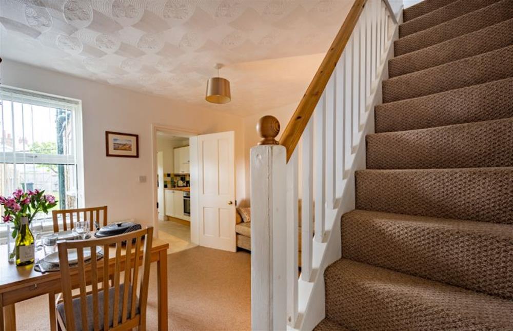 Ground floor: Stairs which are steep lead to the first floor at Holly Cottage, Heacham near Kings Lynn