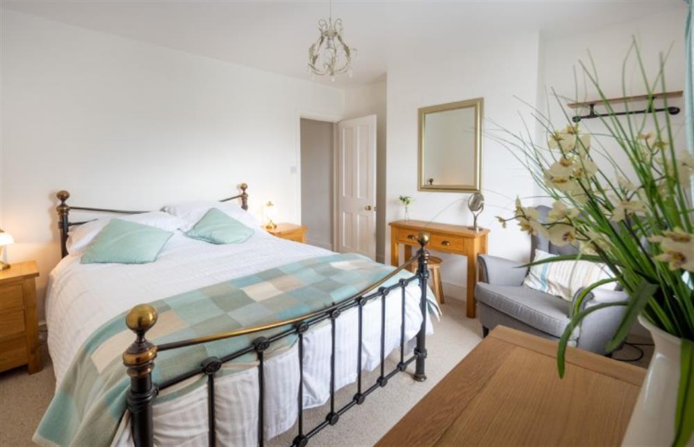 Holly Cottage: The spacious master bedroom with a king-size bed at Holly Cottage, Heacham near Kings Lynn