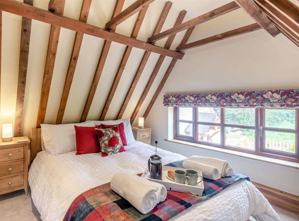 Double bedroom at Holly Cottage in Hemblington, near Norwich, Essex