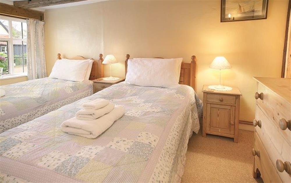 First floor: Twin bedroom with two 3' beds at Holly Cottage, Huntingfield