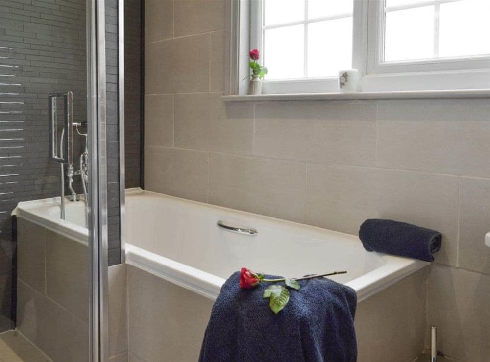 Family bathroom with separate shower cubicle at Holly Cottage in Pett, E. Sussex., East Sussex