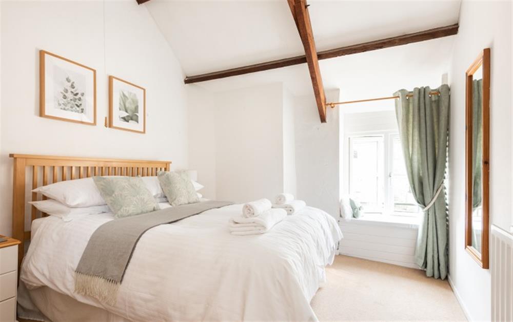 Another view of the tasteful master bedroom at Holly Cottage in Slapton