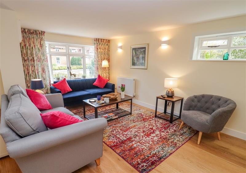 Relax in the living area at Holly Cottage, Stratford-Upon-Avon